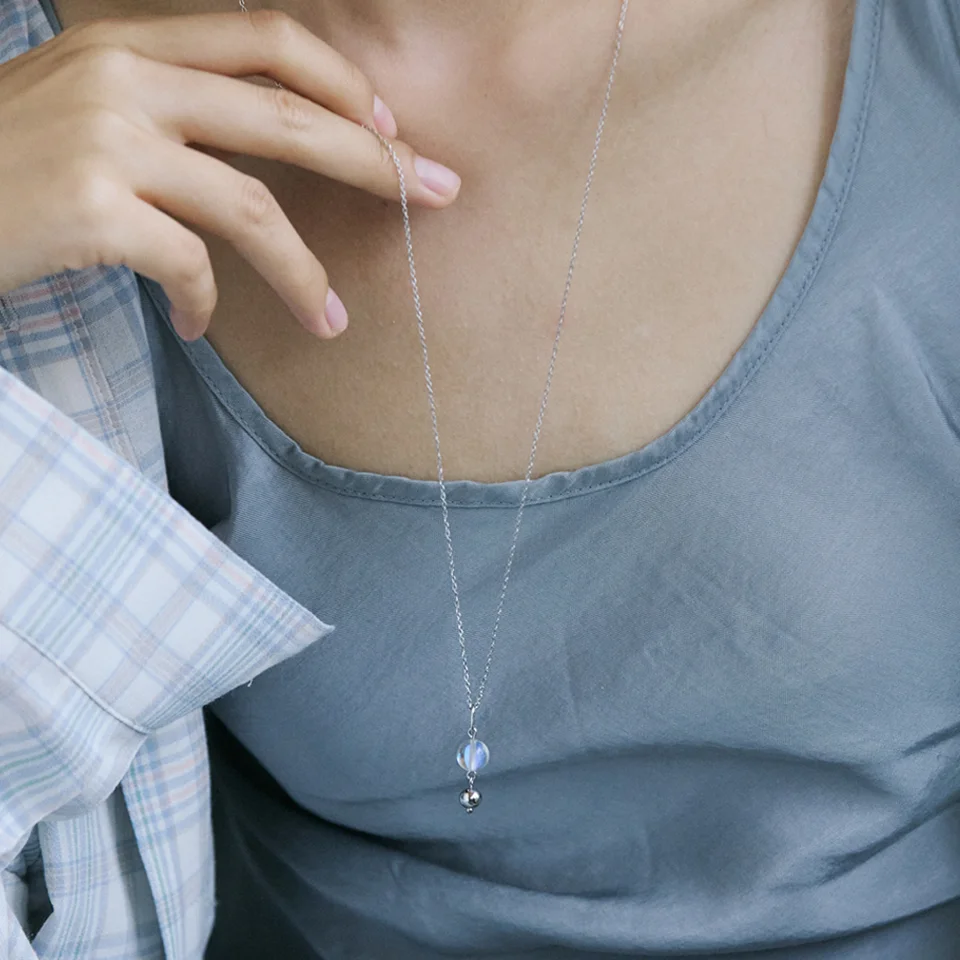 Clear moonstone and silver ball free necklace