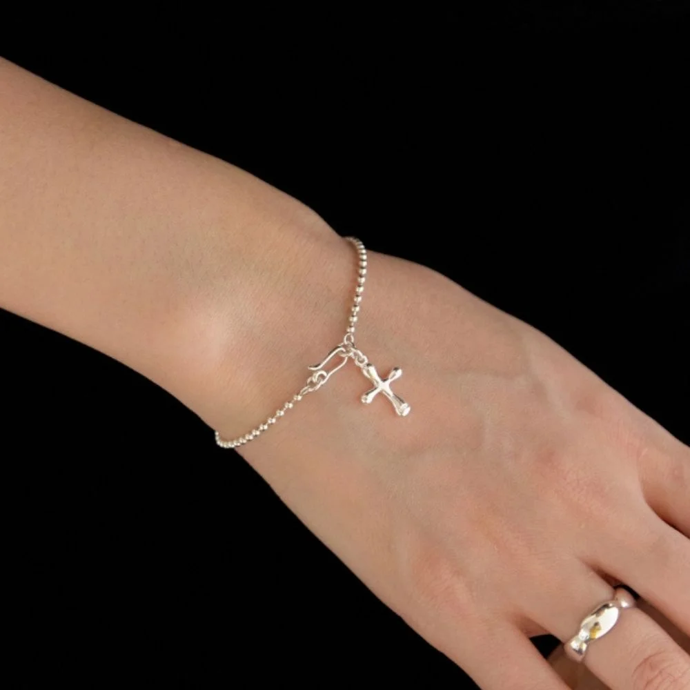 Cross melting ball bracelet