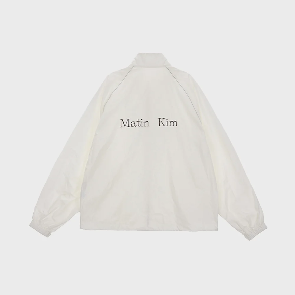 MATIN KIM LOGO COATING JUMPER IN IVORY