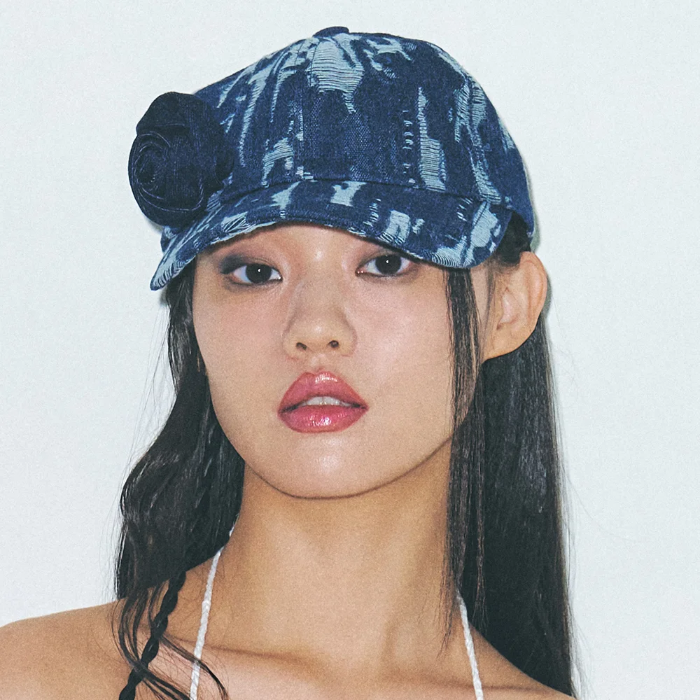 CORSAGE DESTROYED DENIM CAP IN RAW INDIGO