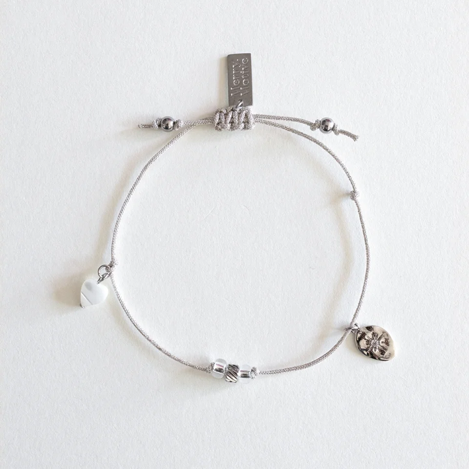 Shining motifs silver string bracelet