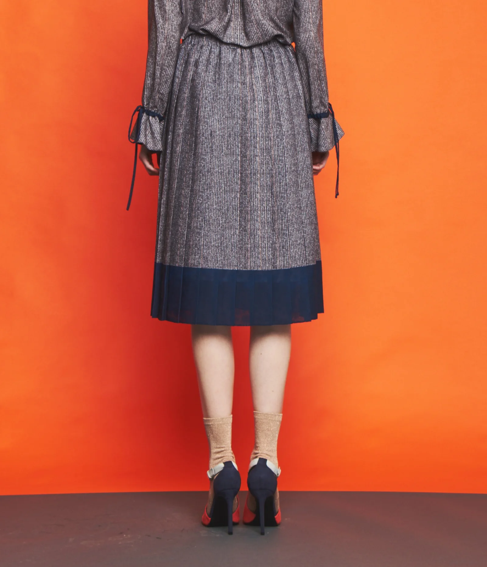 CHECK PLEATED SKIRT