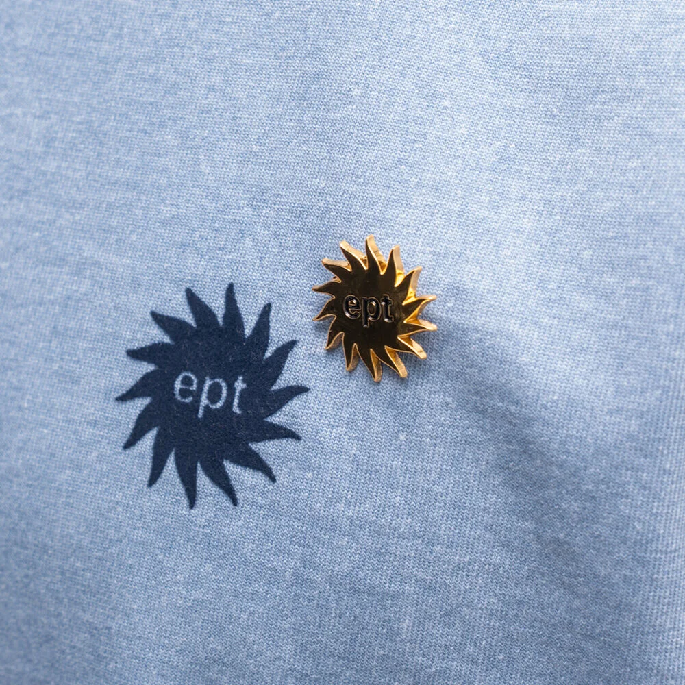SUN LOGO PIN BADGE