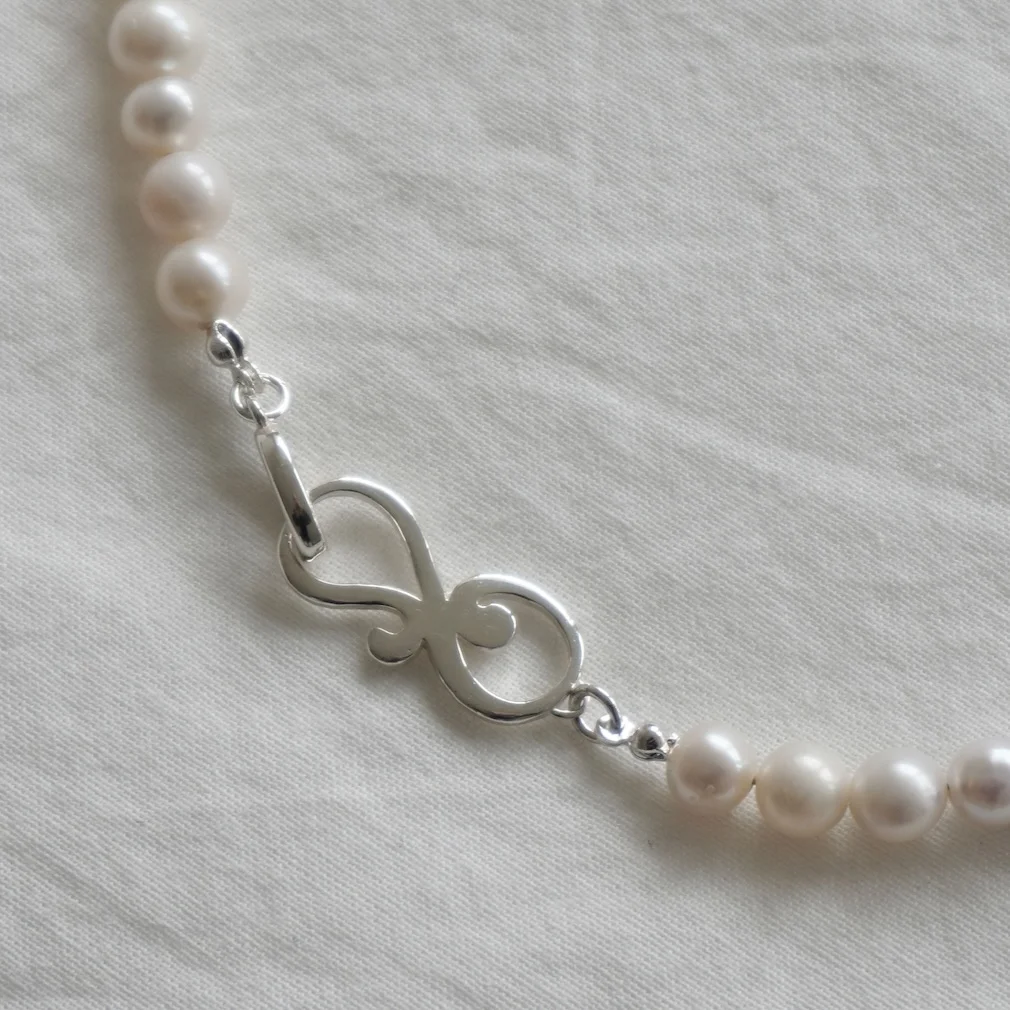 scroll peal chocker