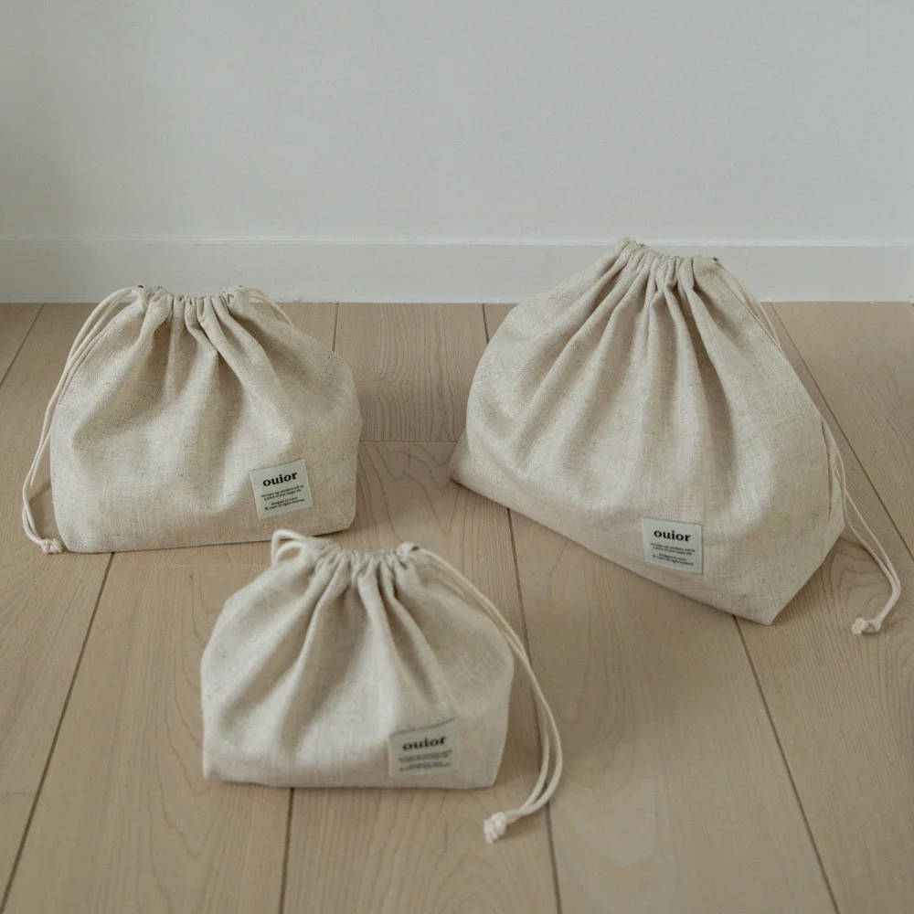 ouior chubby string pouch_herringbone beige
