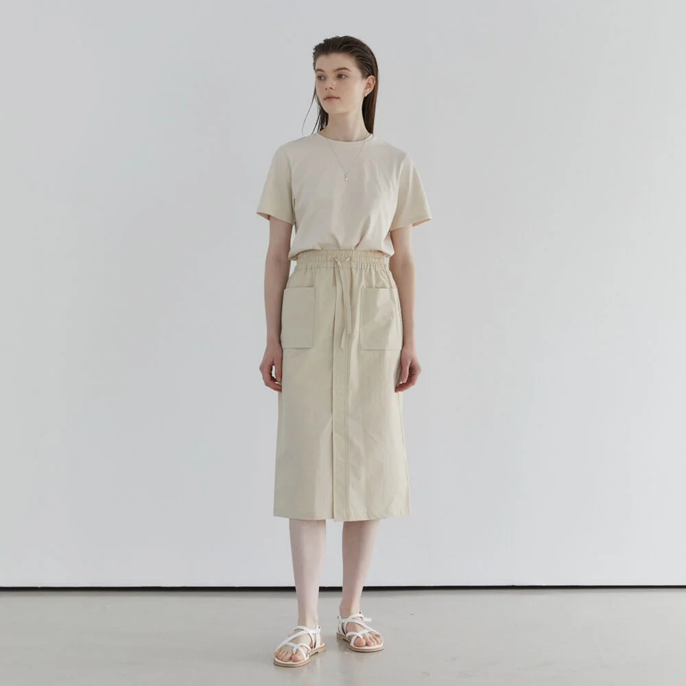 POCKET MIDI SKIRT - BEIGE