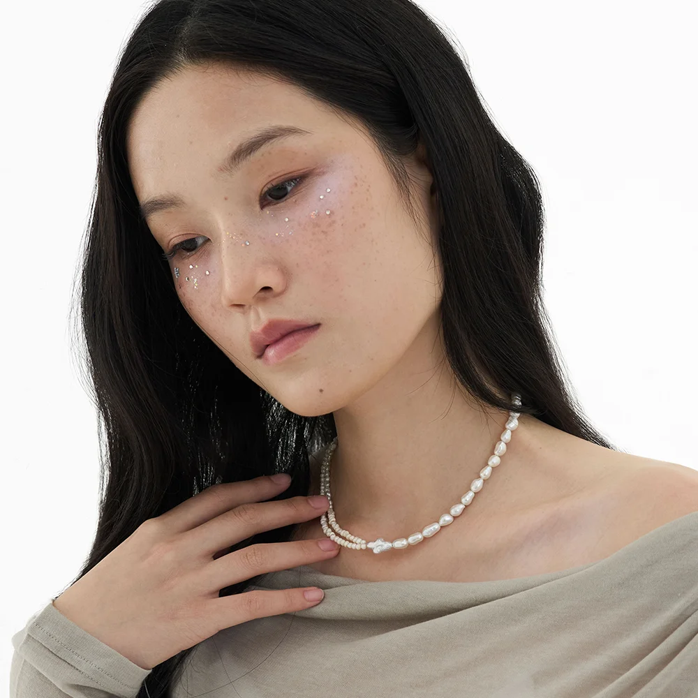 an unbalanced pearl necklace