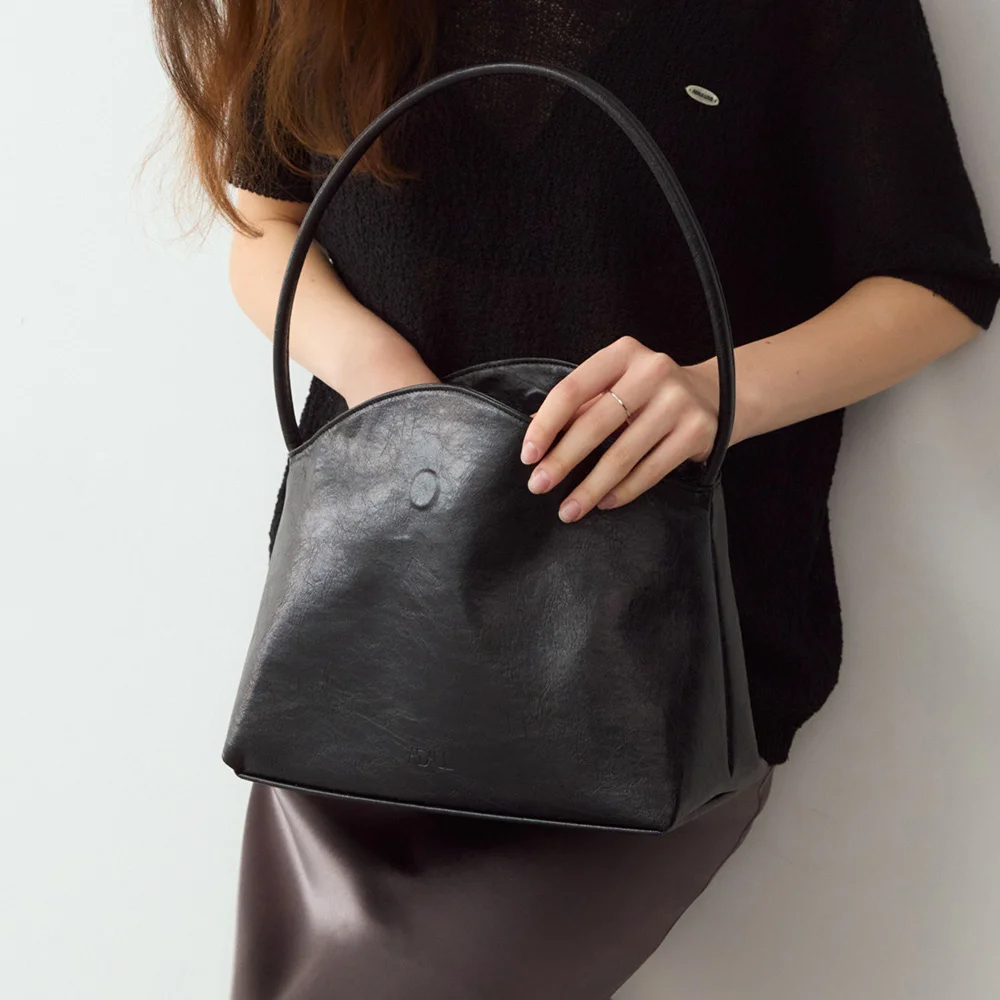 Ake soft flip shoulder bag - black