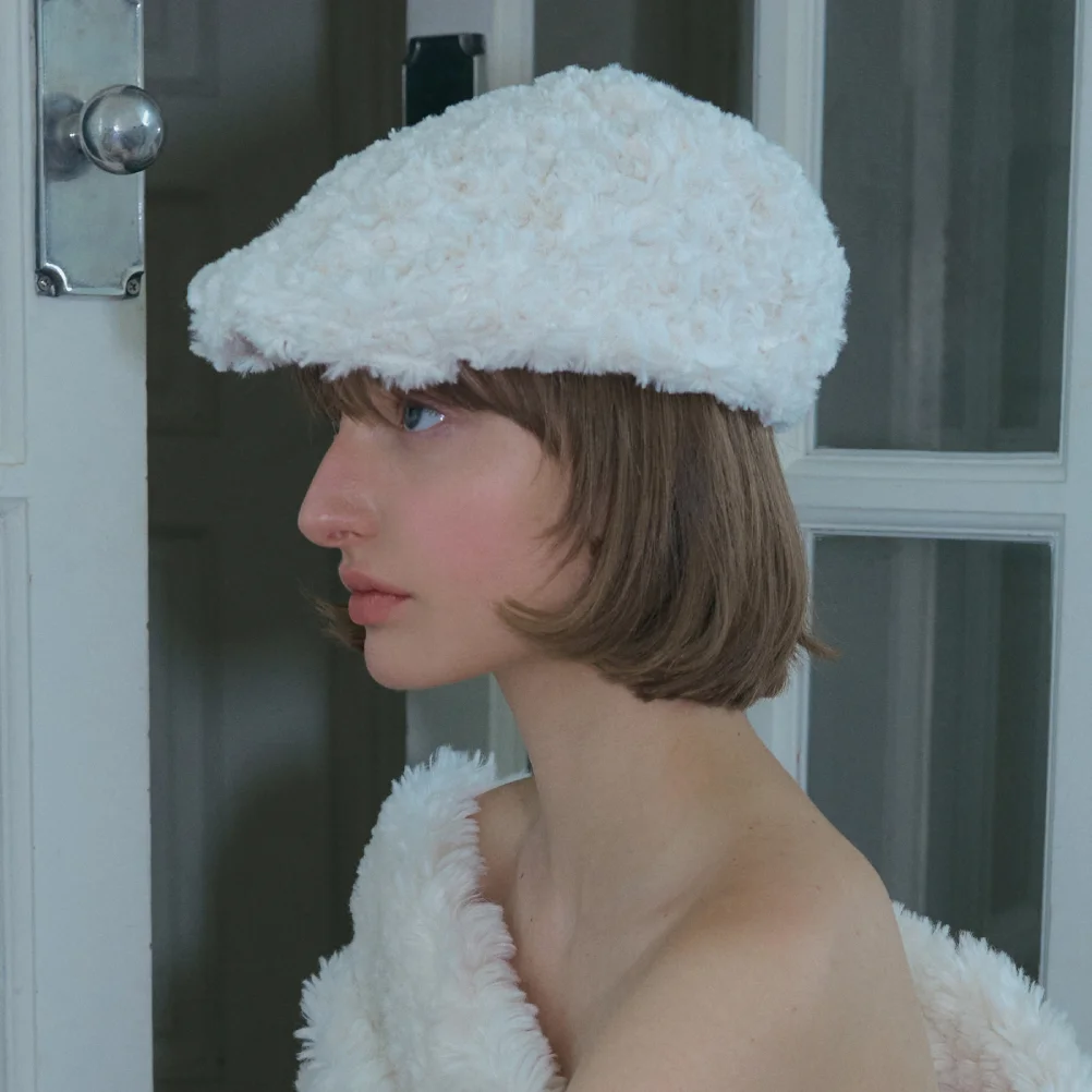 ROSE COIL FLAT CAP IN CREAM