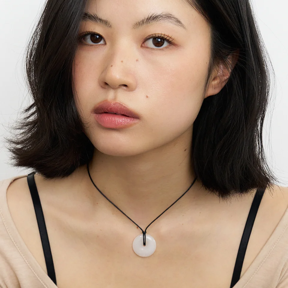 white disc string necklace
