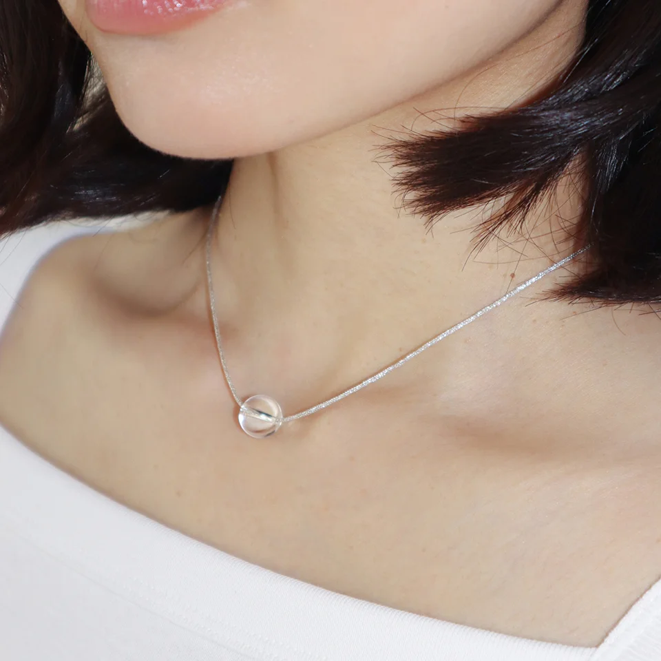 silver string ball necklace