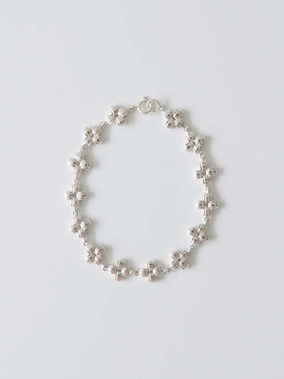 LAYERED CROSS CHAIN BRACELET
