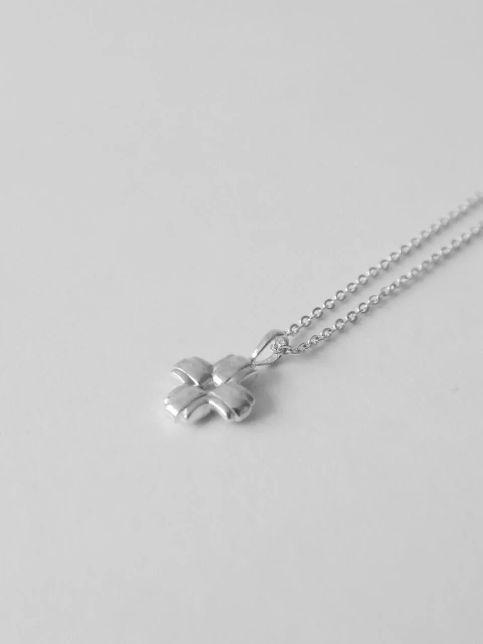 SMALL LAYERED CROSS NECKLACE