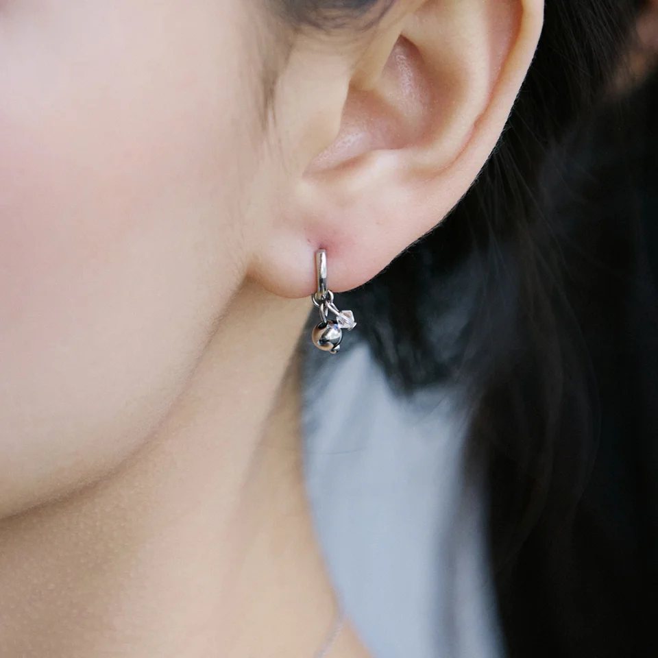 Ball and crystal hoop earring