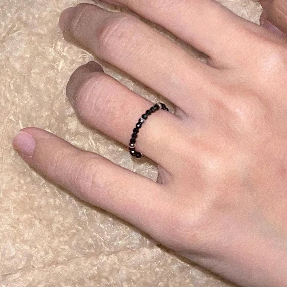 Black gemstone with surgical ball ring