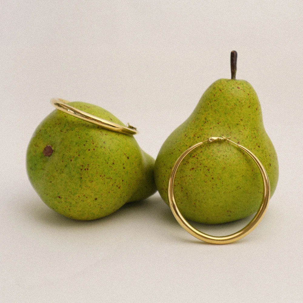 Vintage bold hoop 18k earring