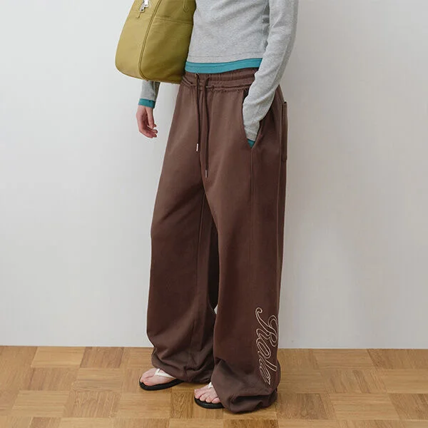 STITCH LOGO CURVED SWEAT PANTS BROWN