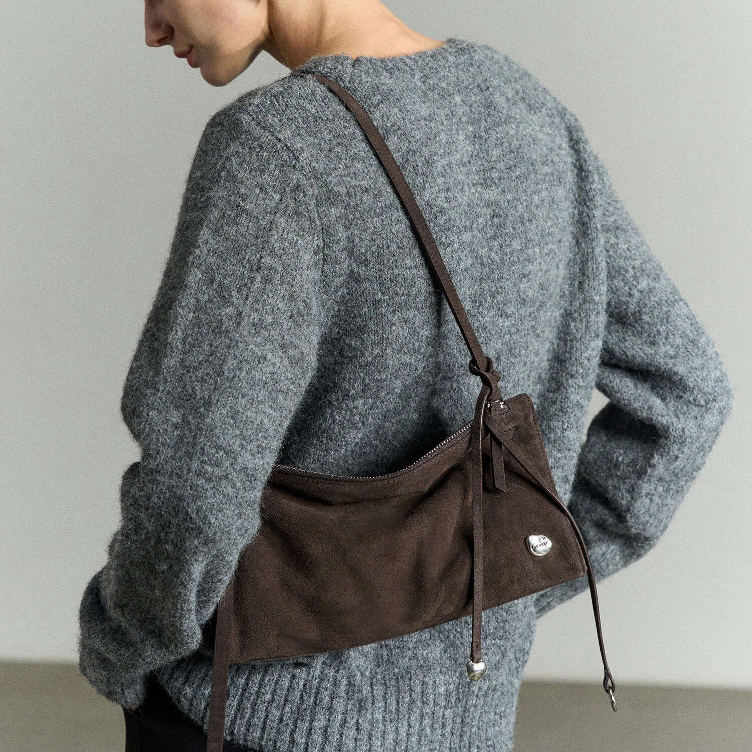 ASYMMETRIC COWHIDE SHOULDER BAG