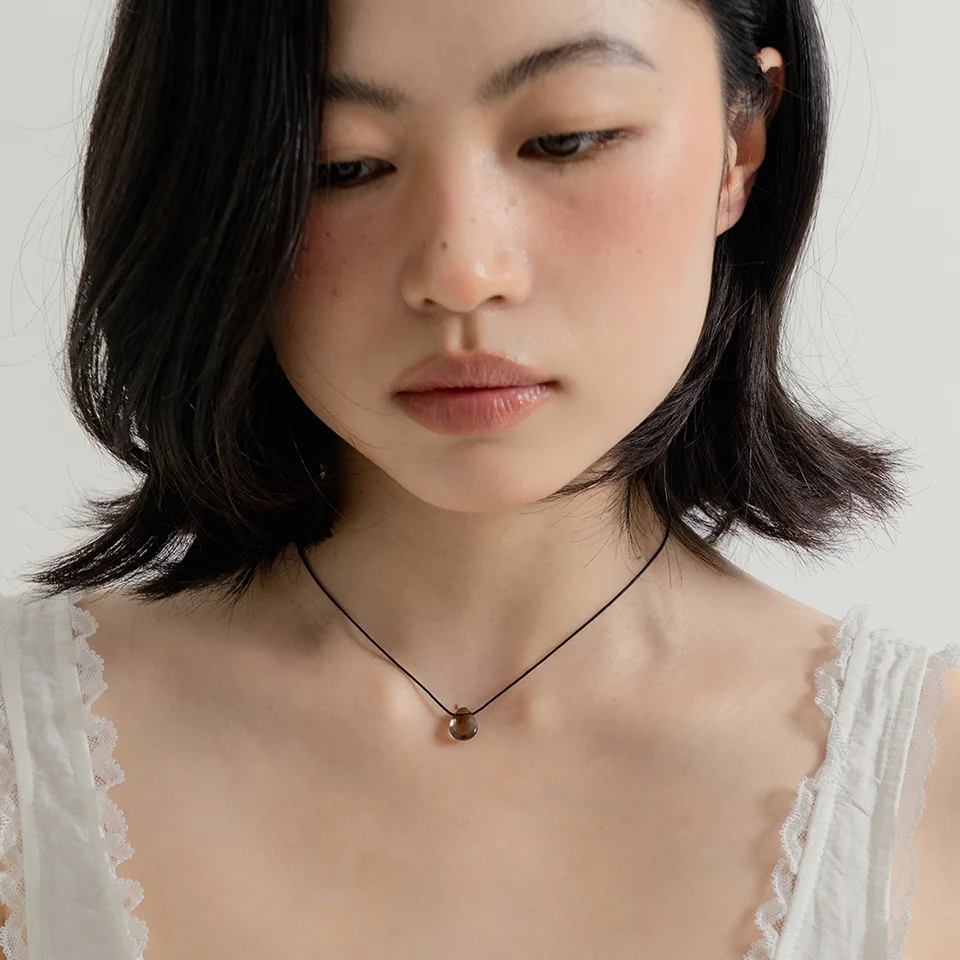 smoky drop string necklace