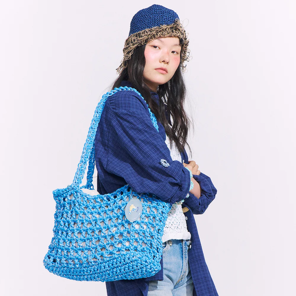 WATERY TRAVEL NET LIGHT BLUE