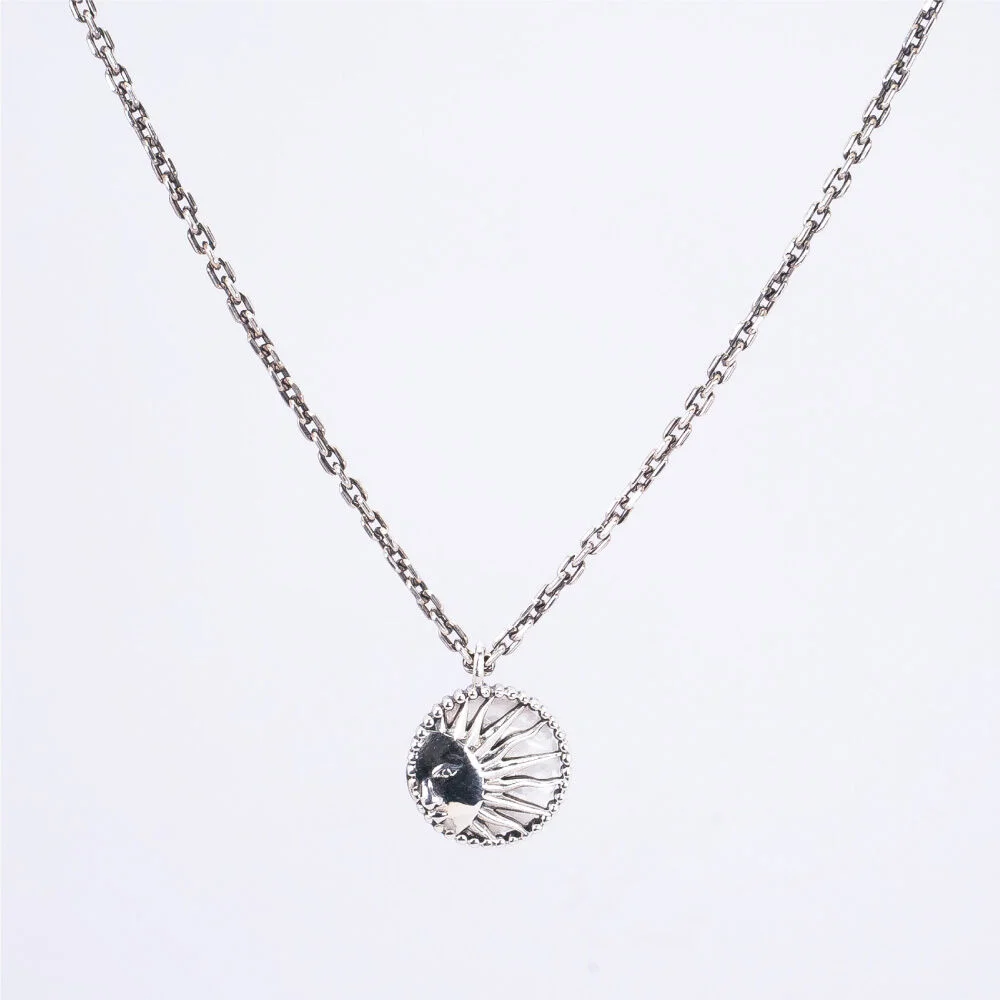 HR 68N_Mother of Pearl Sun Carved Necklace