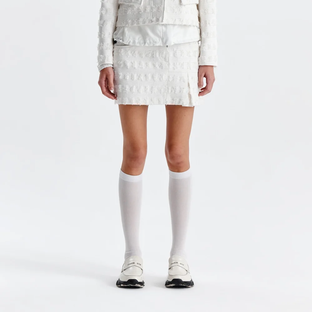 PLEATS MIXED TWEED MINI SKIRT IN IVORY