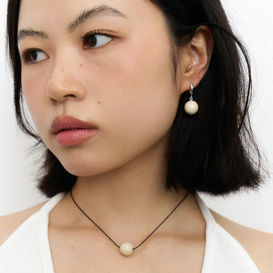 beige ball drop earring