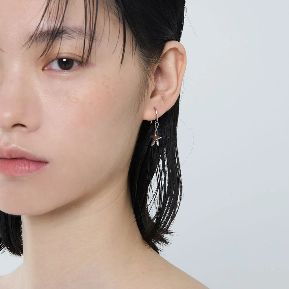 Atypical Stellar Curved Earring