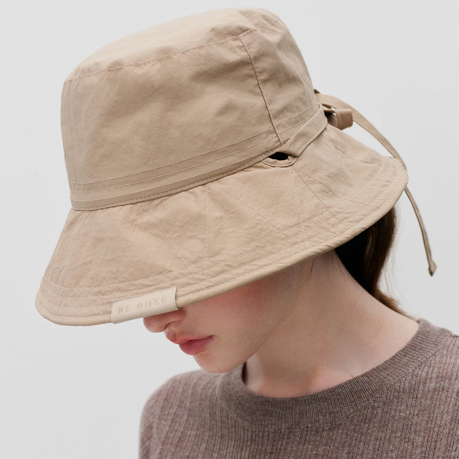 ADJUSTABLE STRAP BUCKET HAT SAND