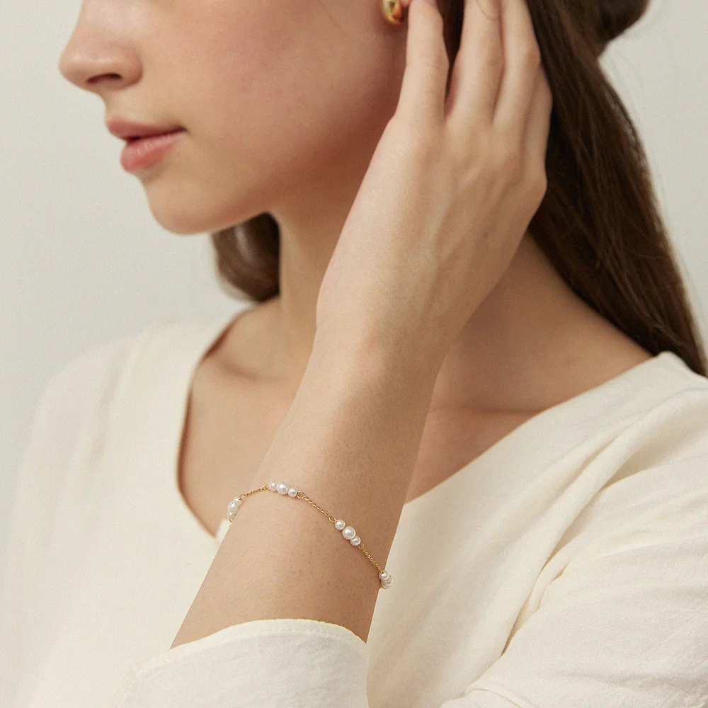 Regular mini pearl bracelet - gold