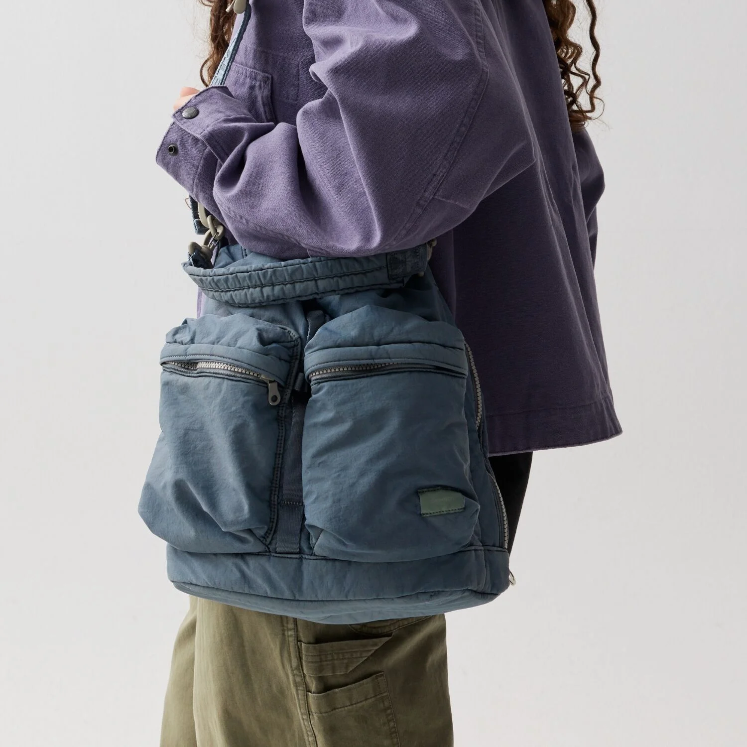 NMR X SWC DYED BUCKET BAG 002 DUSTY BLUE