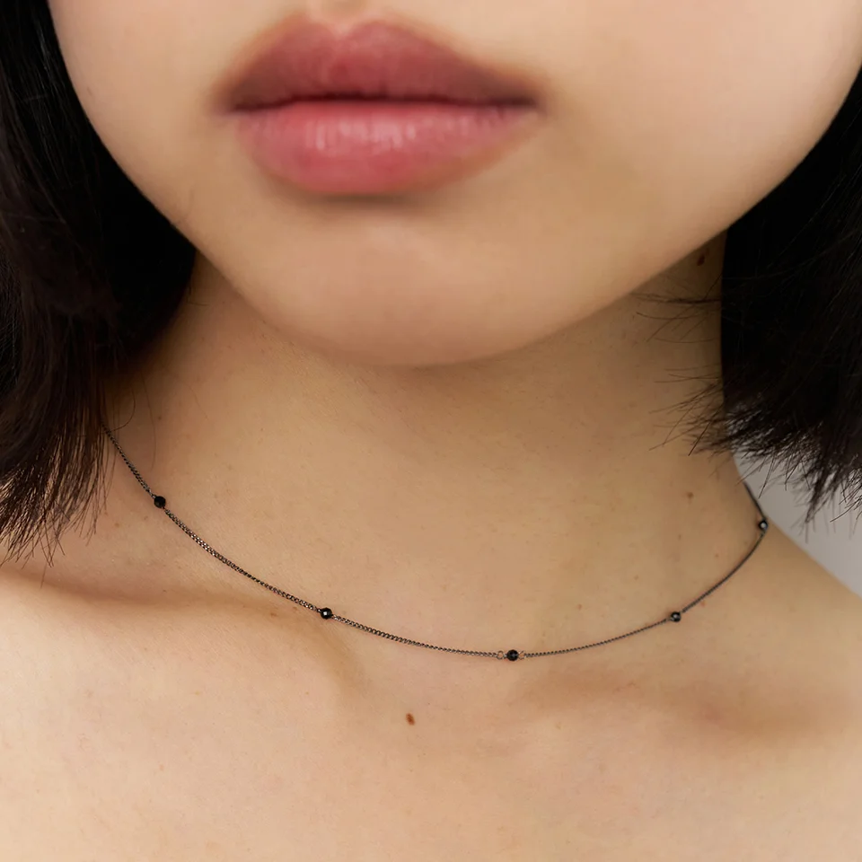black chain dol necklace