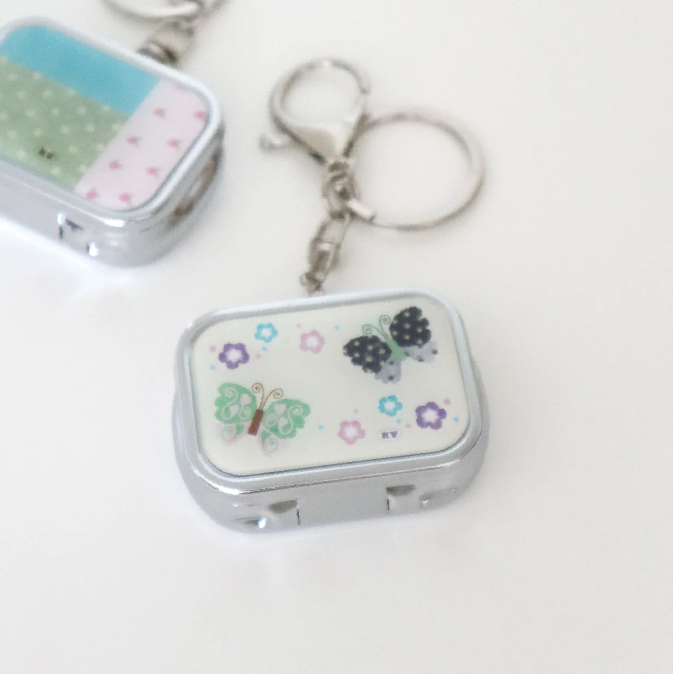 Tincase mirror keyring - Butterfly dance